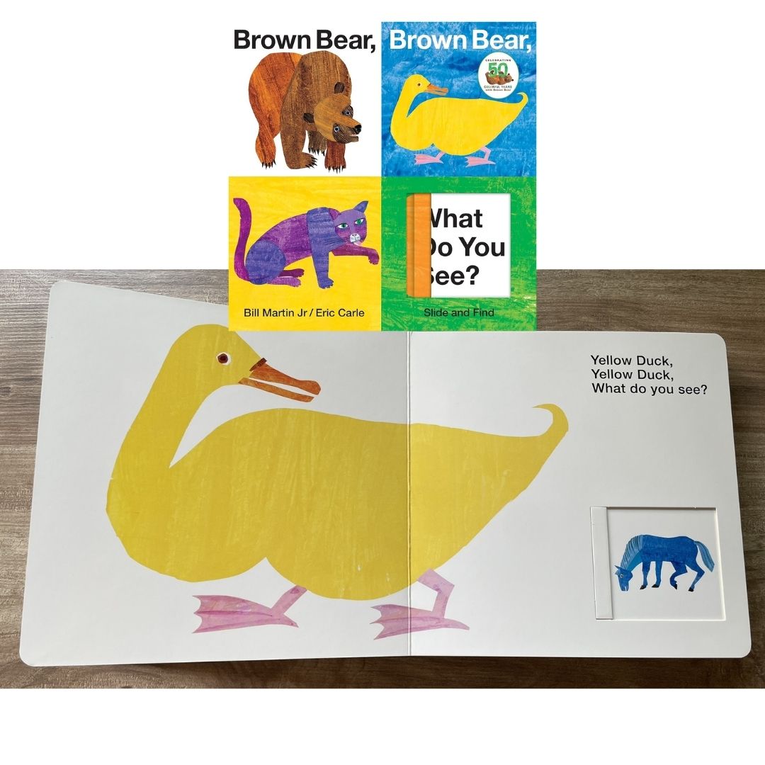 Brown Bear, Brown Bear, What Do You See? Slide and Find: An interactive board book (by Eric Carle) brand new, with SLIGHT DENTS on book cover