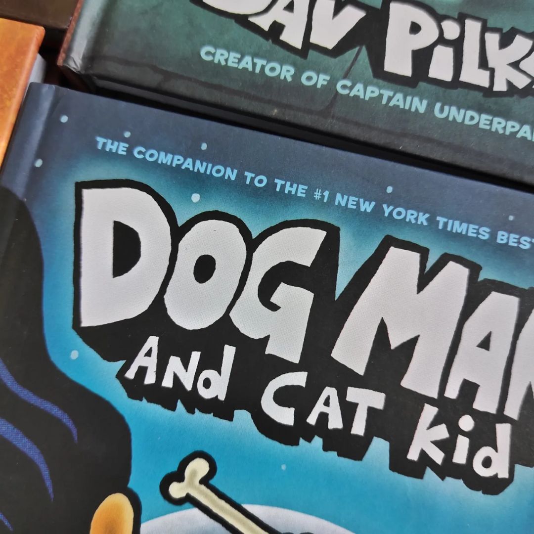 Dog Man set of 17 hardcover books, no box (slight dents and tears on book covers, book pages no damage)