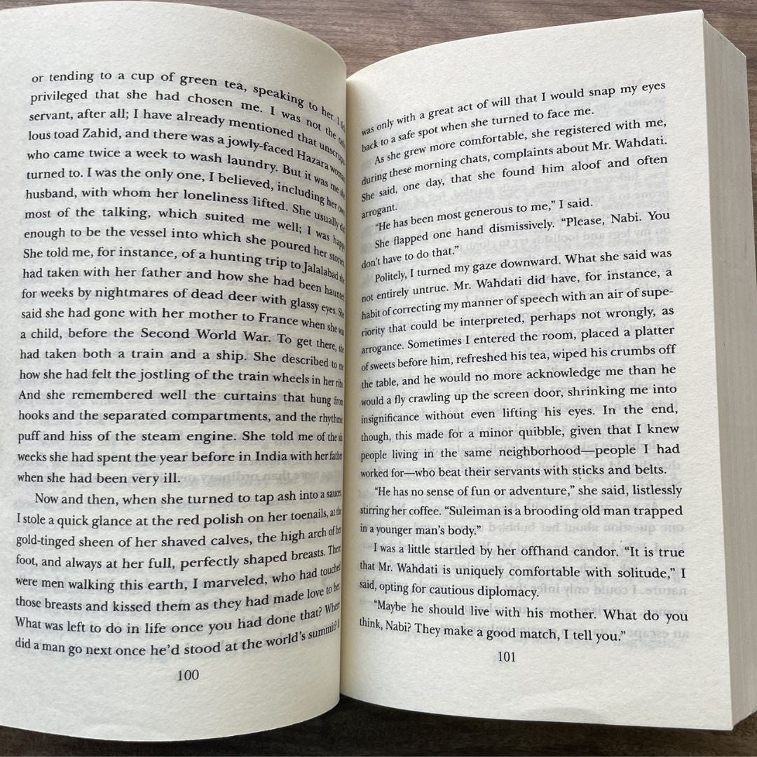 And the Mountains Echoed (mass paperback) - brand new, with slightly yellowed pages
