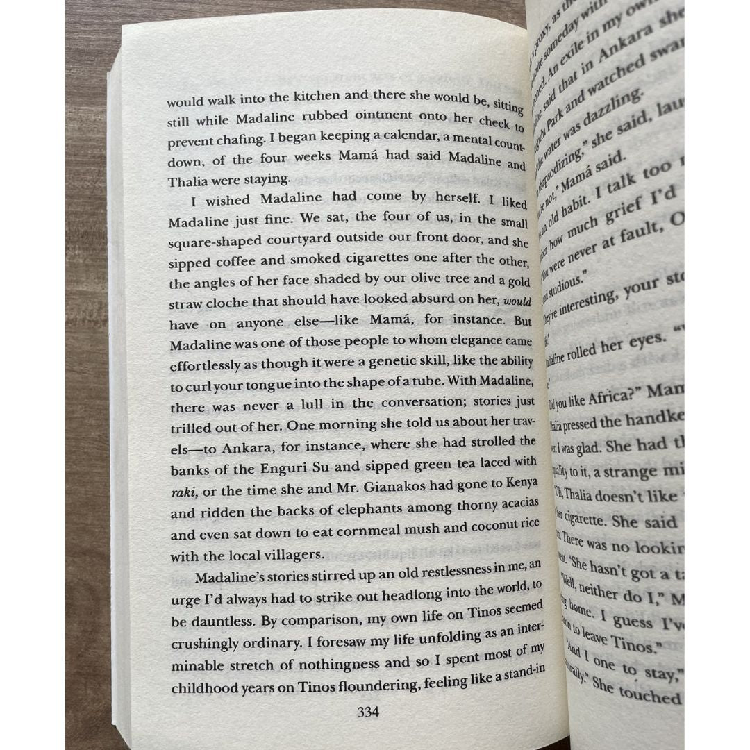 And the Mountains Echoed (mass paperback) - brand new, with slightly yellowed pages