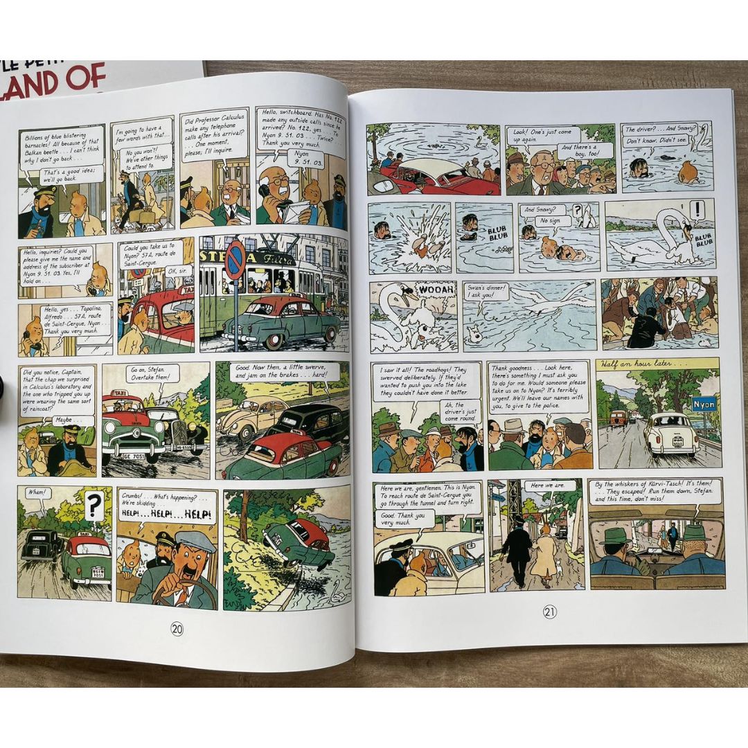 The Adventures of Tintin, 23 brand new softcover books, box set (BOX with slight DENTS, books no damage.)