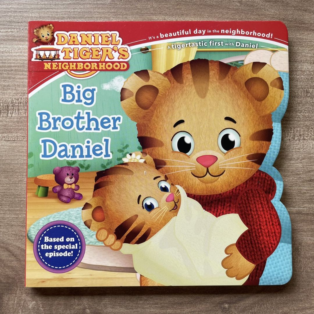 Big Brother Daniel (Daniel Tiger's Neighborhood) (brand new Shaped Board Book) with SLIGHT DENTS on book cover