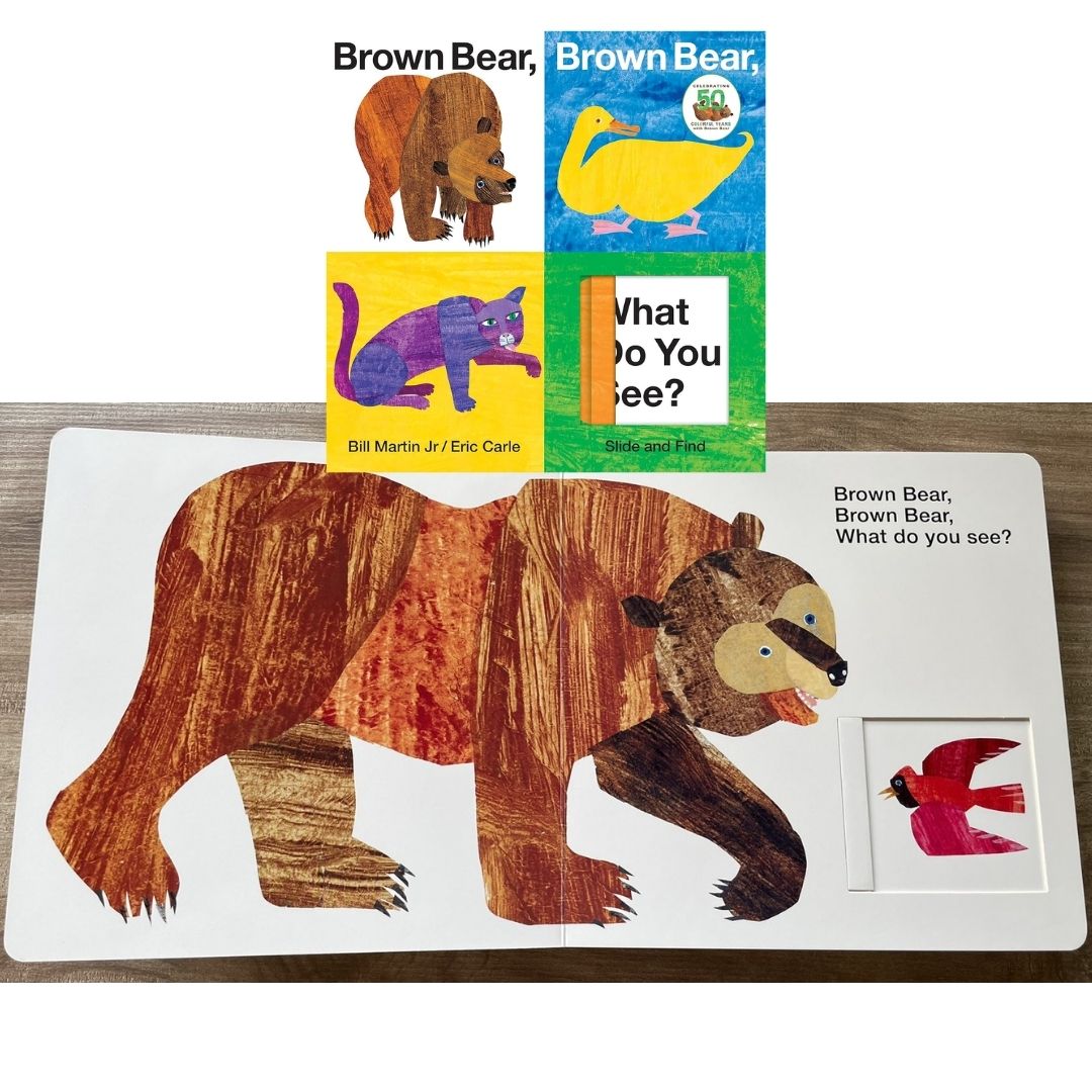 Brown Bear, Brown Bear, What Do You See? Slide and Find: An interactive board book (by Eric Carle) brand new, with SLIGHT DENTS on book cover