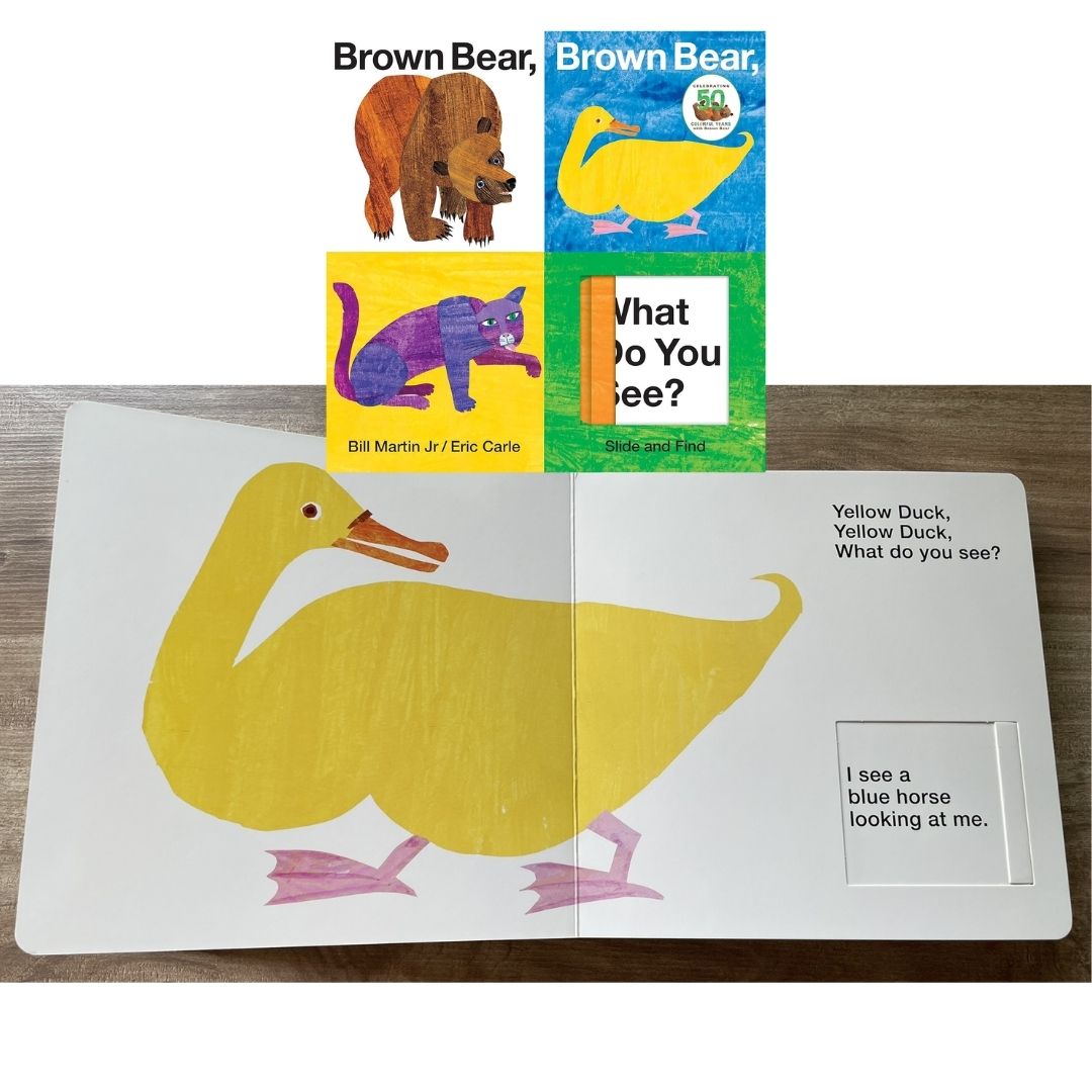 Brown Bear, Brown Bear, What Do You See? Slide and Find: An interactive board book (by Eric Carle) brand new, with SLIGHT DENTS on book cover