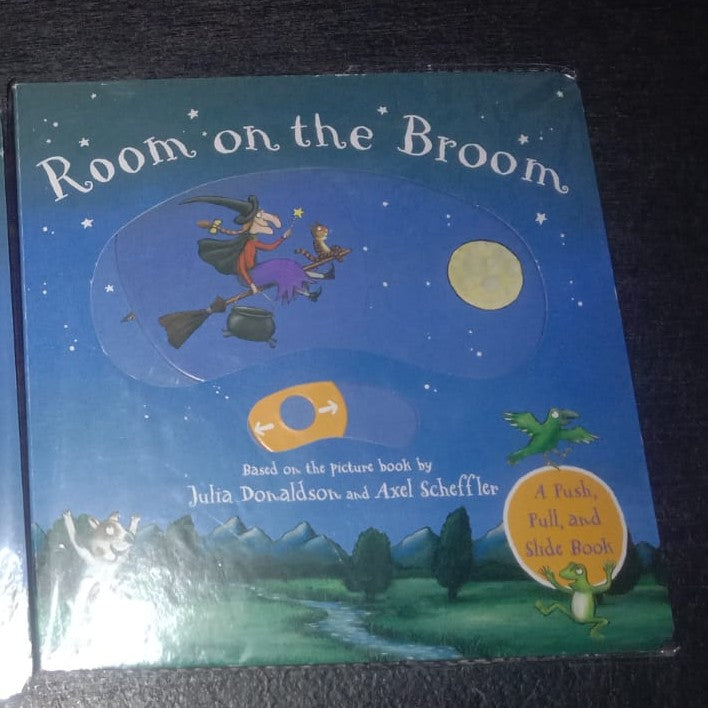 Room on the Broom by Julia Donaldson (A Push Pull and Slide Board Book) brand new, with SLIGHT DENTS on book cover