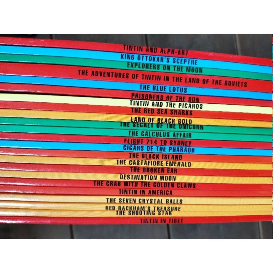 The Adventures of Tintin, 23 brand new softcover books, box set (BOX with slight DENTS, books no damage.)