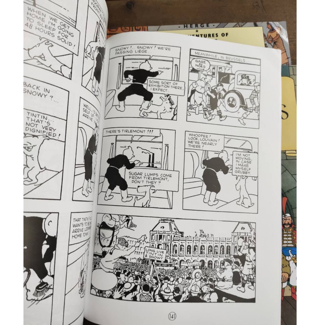 The Adventures of Tintin, 23 brand new softcover books, box set (BOX with slight DENTS, books no damage.)